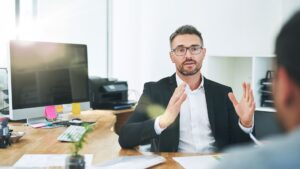 person explaining about file to another person